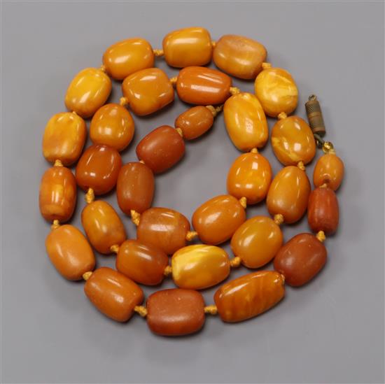 A single strand amber bead necklace, gross weight 48 grams, 57cm.